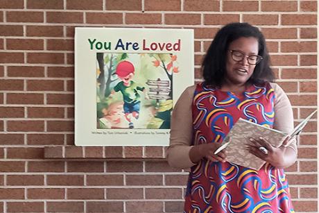 A photo of Alydia Smith making grant announcement