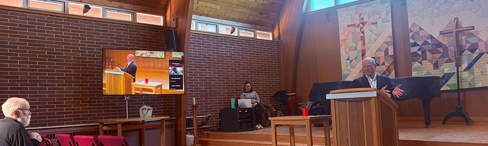 People sitting inside the chapel